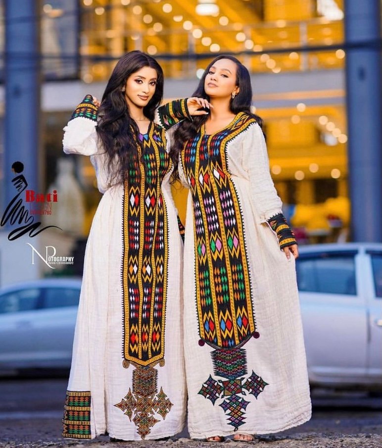 Telfi Embroidered Habesha Kemis – White with Dark Multicolour Tibeb – Azmarino Fashion Boutique